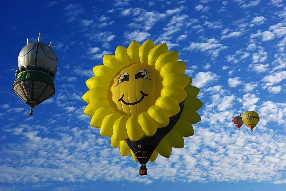 yellow sunflower hot air balloon under cloudy blue sky during daytime, HD wallpaper