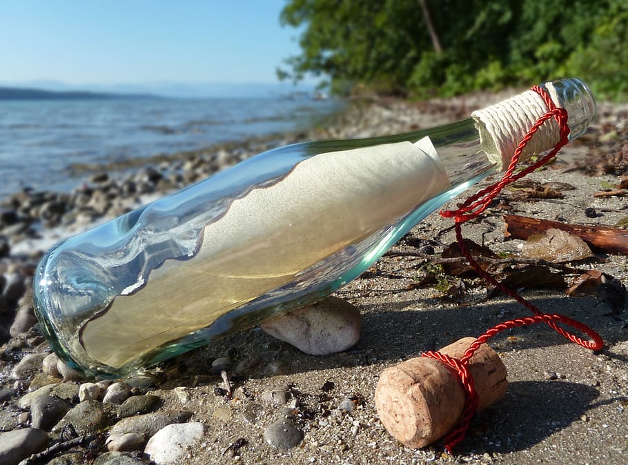 clear label bottle with white paper inside, message in a bottle HD wallpaper