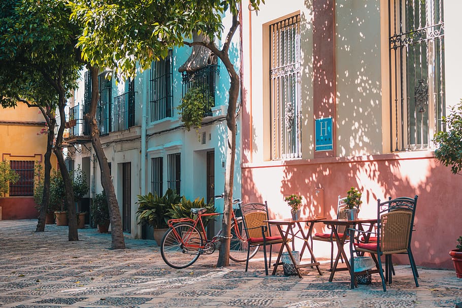 two brown table outside, bike park near to patio table, red bike HD wallpaper