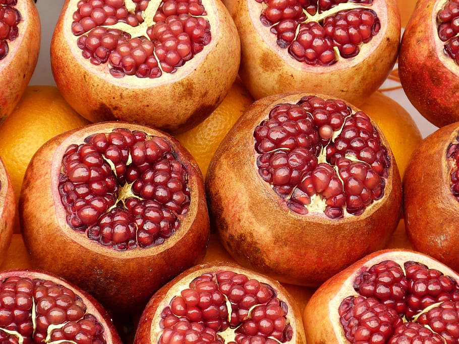 peeled red and orange seeds fruits, bazaar, istanbul, market