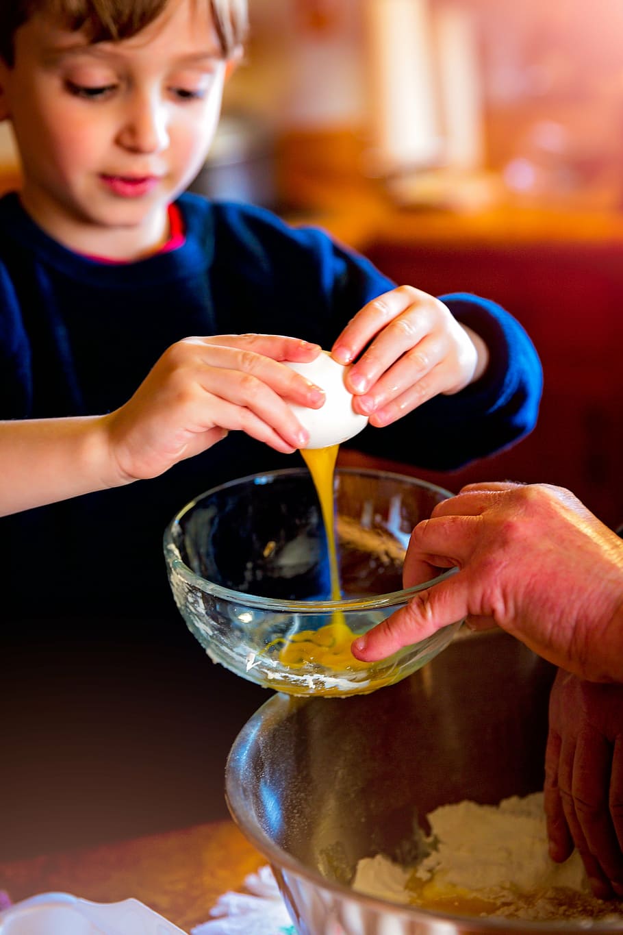 boy breaking an egg over a bowl, baking, children, cooking, education