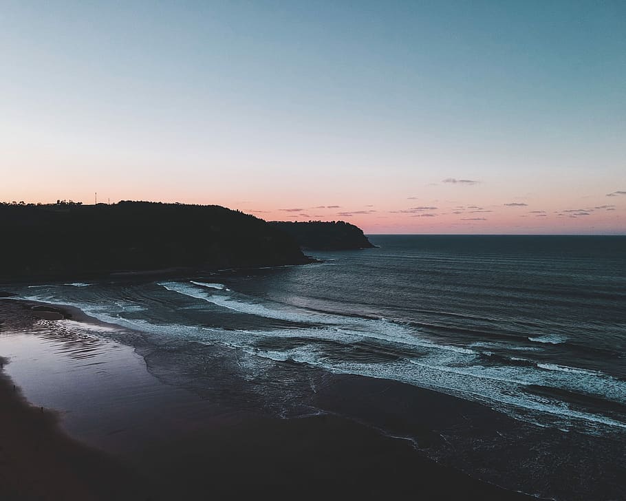 seashore during dawn, landscape photography cliff beside shoreline HD wallpaper