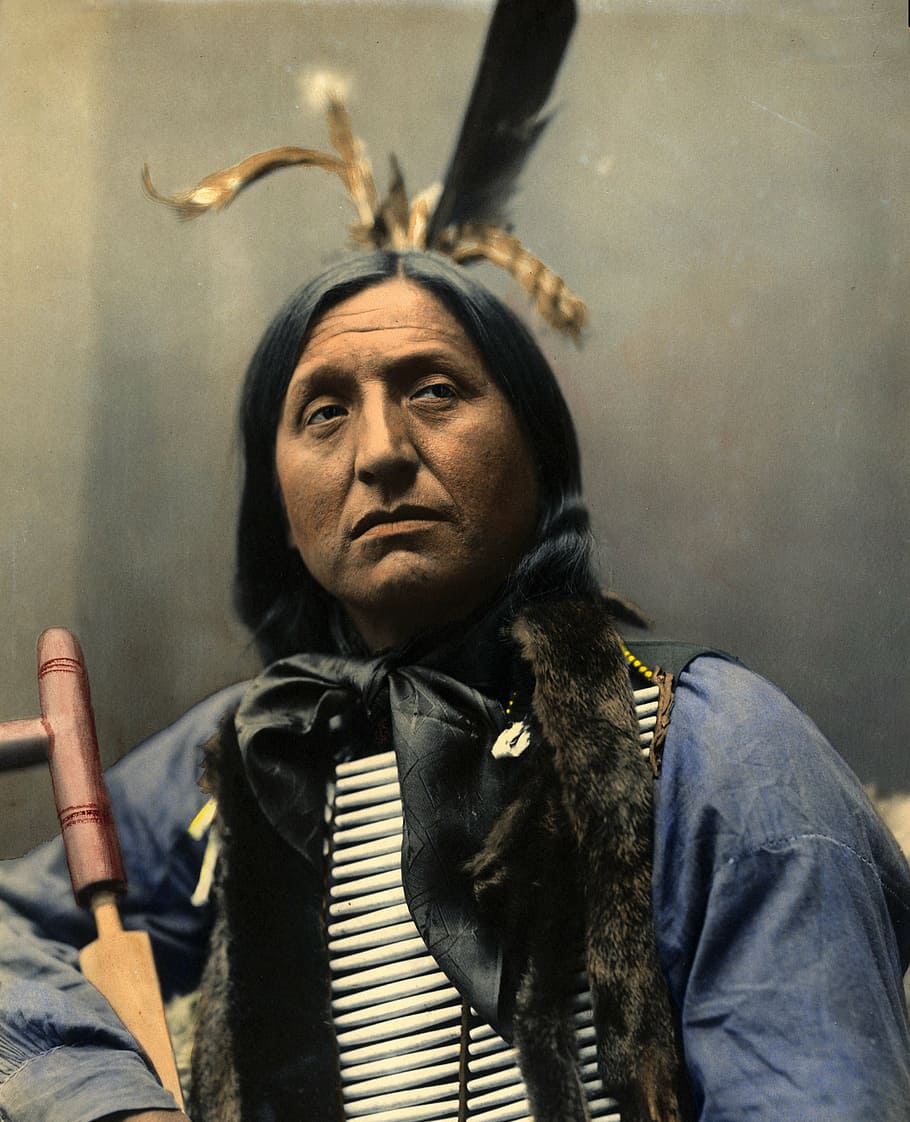 Native American with blue clothes, portrait, left hand bear, chief