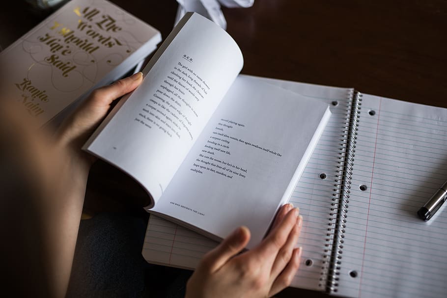 person flipping book, person opening book near table, Young person HD wallpaper