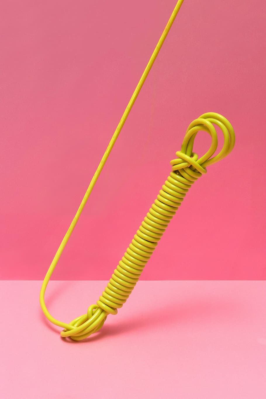 yellow wire on pink surface, electrical, cord, background, flexible HD wallpaper