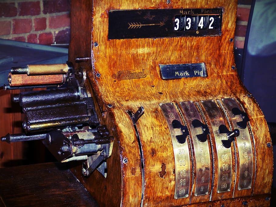 vintage brown cash register, safe, the cashier, the client, finance