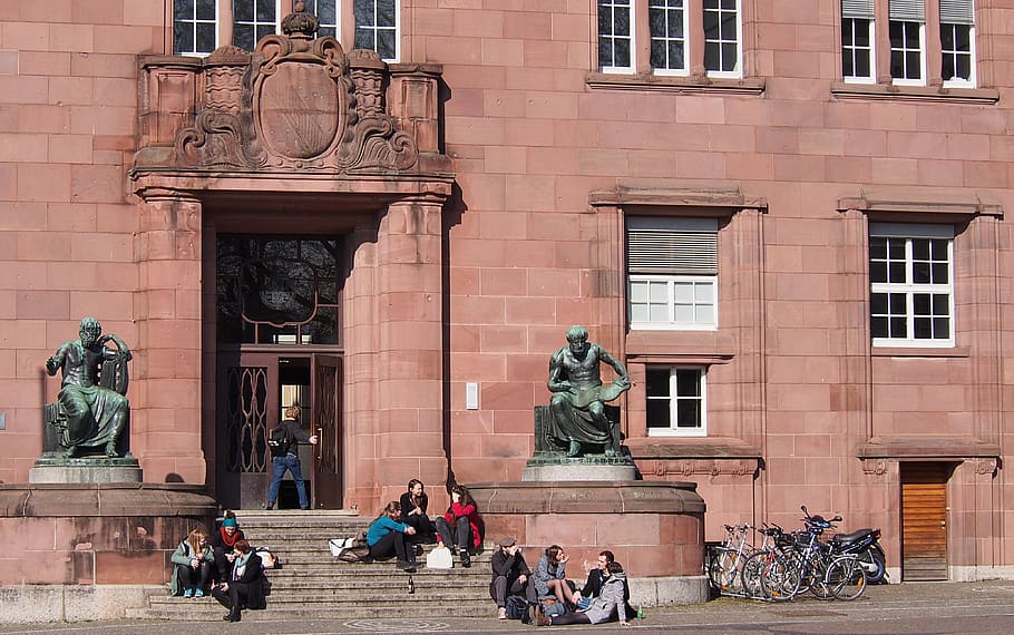people sitting on concrete stairs during daytime, university HD wallpaper