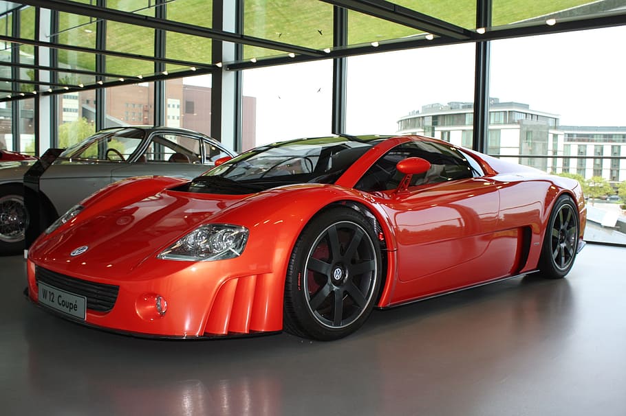 red sports coupe on show room, autostadt wolfsburg, oldtimer HD wallpaper