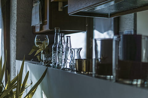 Assorted Clear Glass Bottles With Wine Glass in the Shelf, container HD wallpaper
