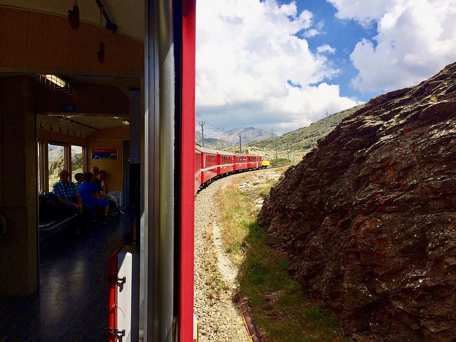 mountains, package, train, railway, tourism, sky, rocks, transportation HD wallpaper