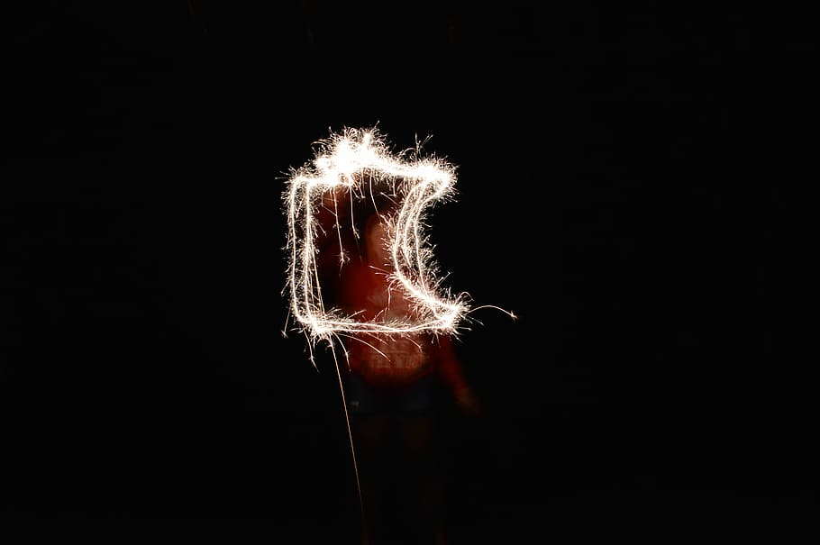 steel wool photography of man holding fireworks, time-lapse photography of person performing fire dance HD wallpaper