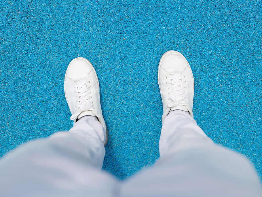 person, legs, shoes, blur, close-up, floor, focus, pants, sneakers HD wallpaper