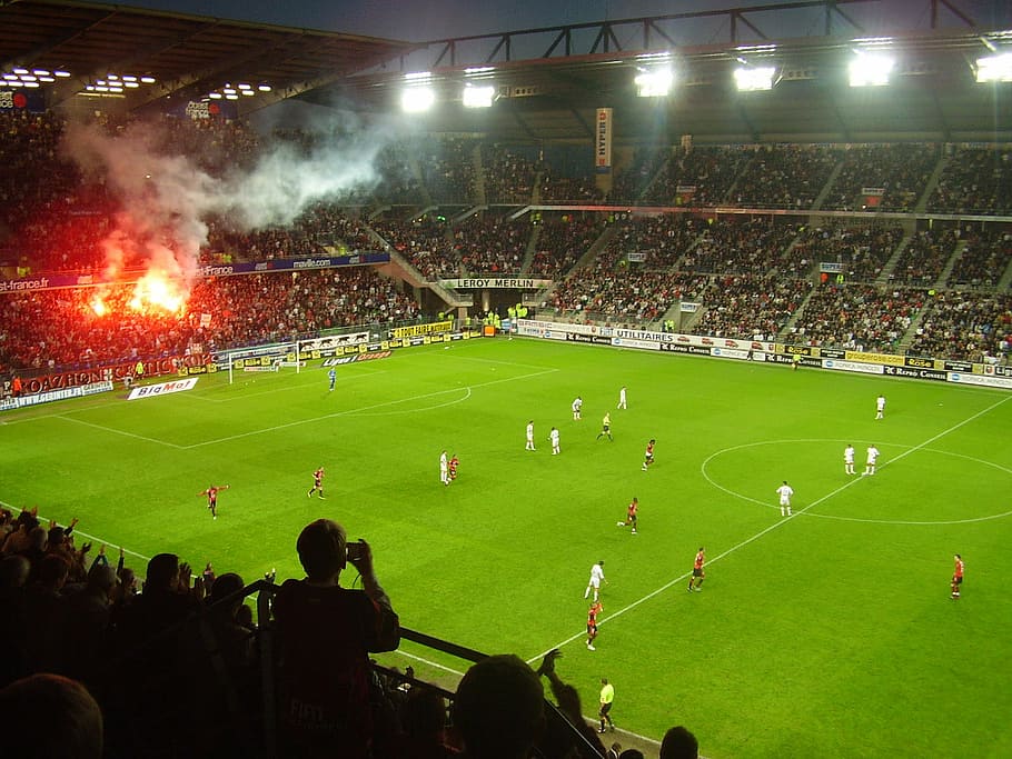 Flares of the Roazhon Celtic Kop at the Roazhon Park in Rennes, France, HD wallpaper