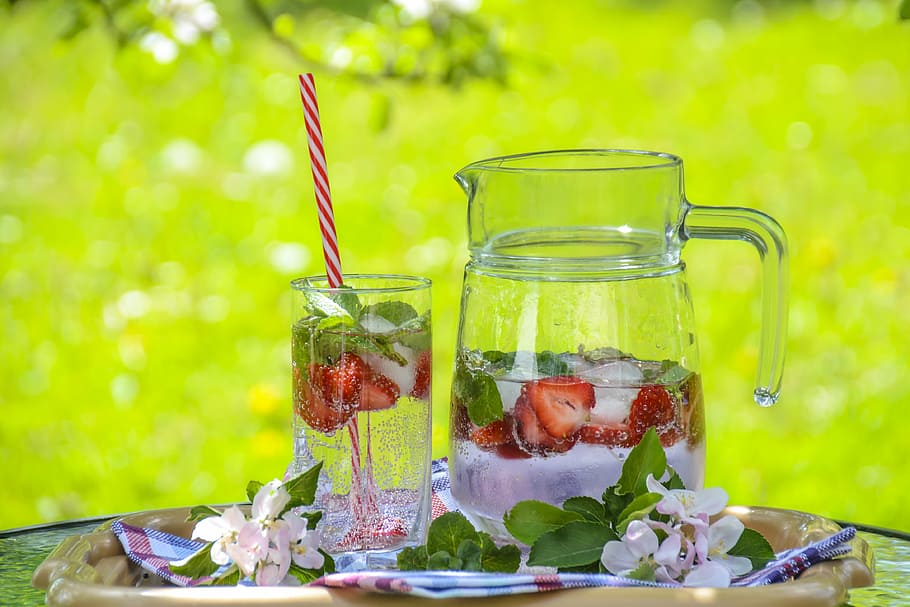 clear glass pitcher beside drinking glass with strawberry juice HD wallpaper