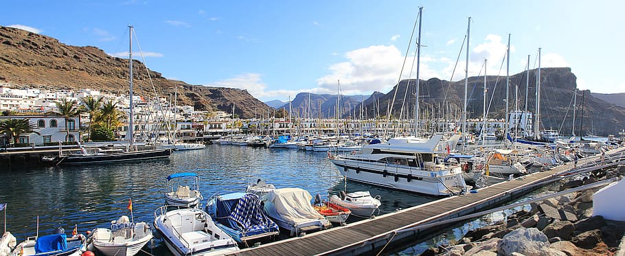 assorted boats and yachts on water under blue sky across mountain during daytime, HD wallpaper