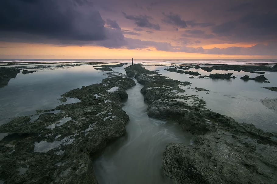 rock formation surround with water under white clouds, sea HD wallpaper