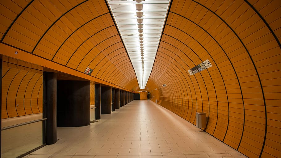 brown hallway, pathway between brown concrete wall, building HD wallpaper