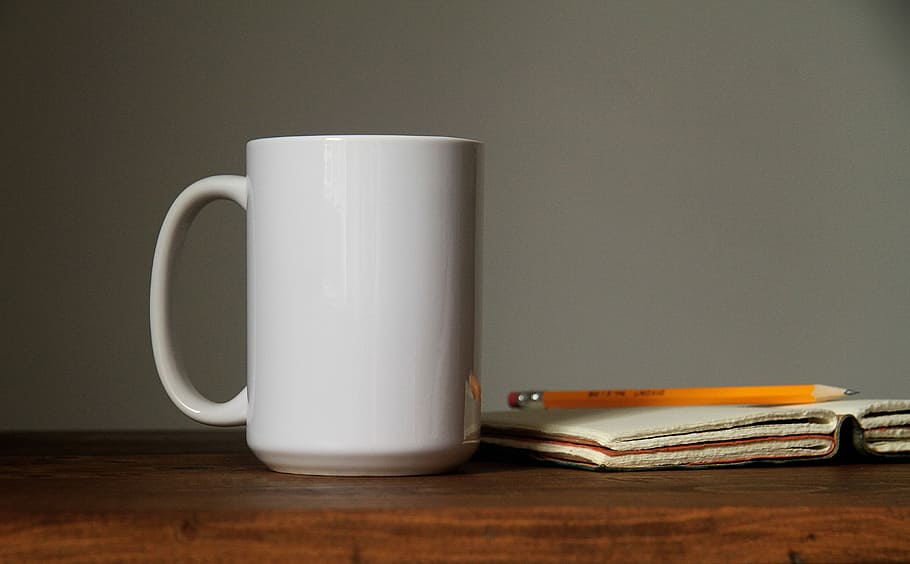 Good Mornings, flat lay photography of white ceramic mug, book, and pencil HD wallpaper