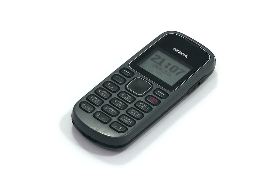 turned-on black Nokia 1280 candybar phone, cell phone, mobile