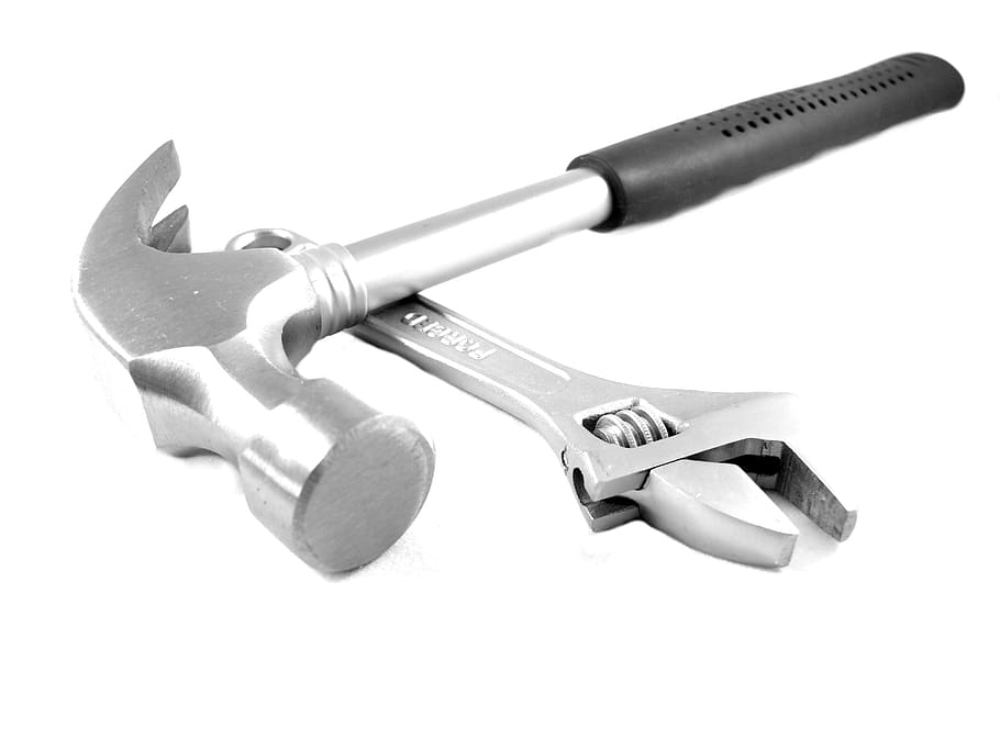 black handle hammer over gray adjustable wrench on white surface HD wallpaper