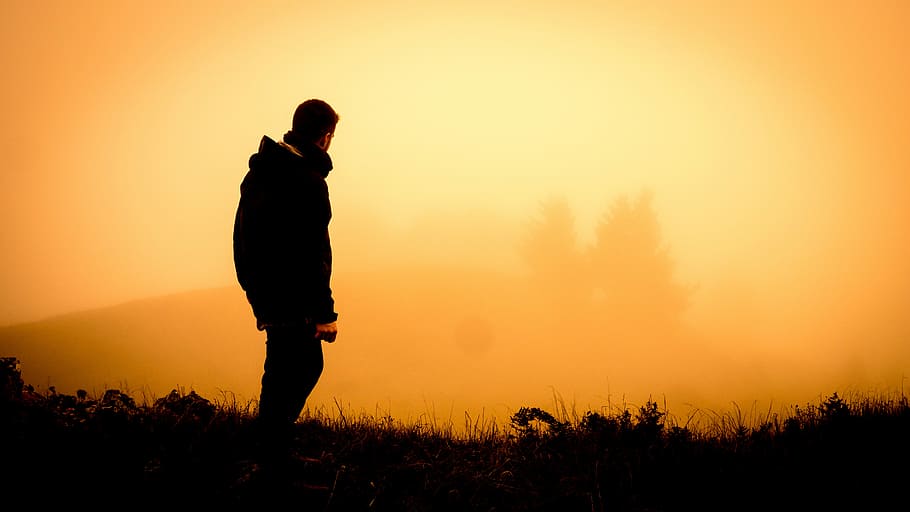 HD wallpaper: silhouette of man standing open field, man standing far away  from foggy mountain | Wallpaper Flare