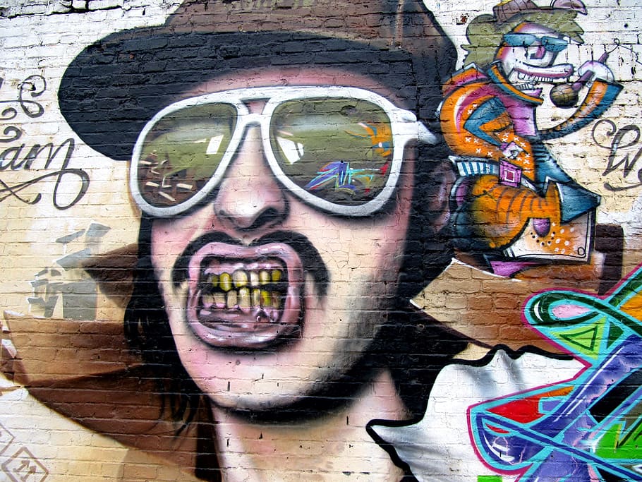 man in brown cap and aviator sunglasses graffiti, berlin wall HD wallpaper