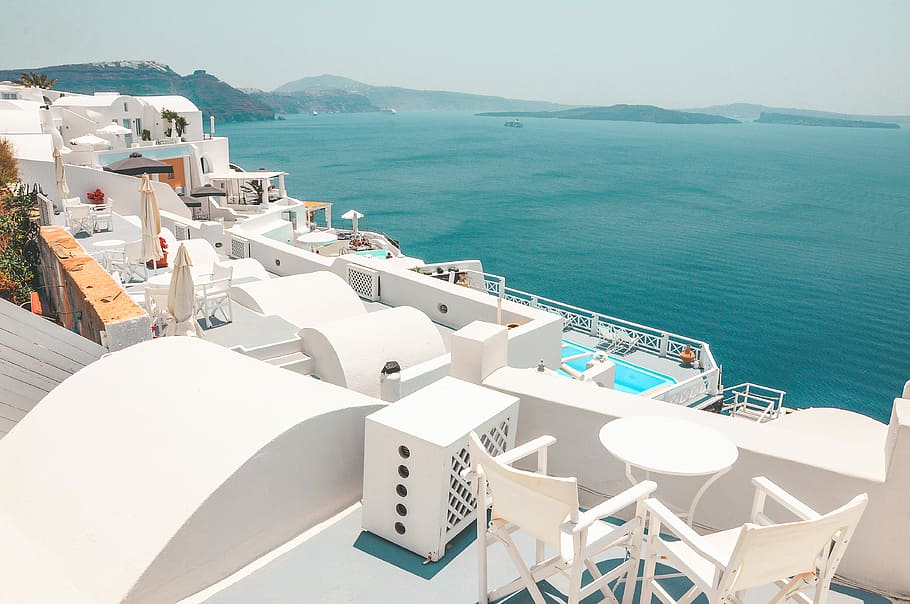 photography of concrete buildings near the body of water, white cruiser ship HD wallpaper