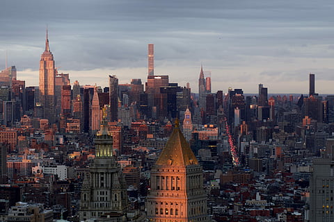 bird's eye photography of New York city skyline, aerial photography of high rise buildings under blue sky HD wallpaper