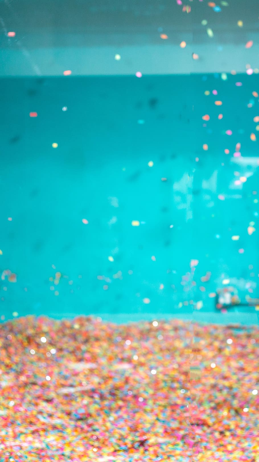 assorted-color stone in tank, assorted-color glitter, water, blue HD wallpaper