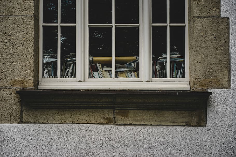 books seen throw windows, clear glass windowpane with white wooden frame HD wallpaper