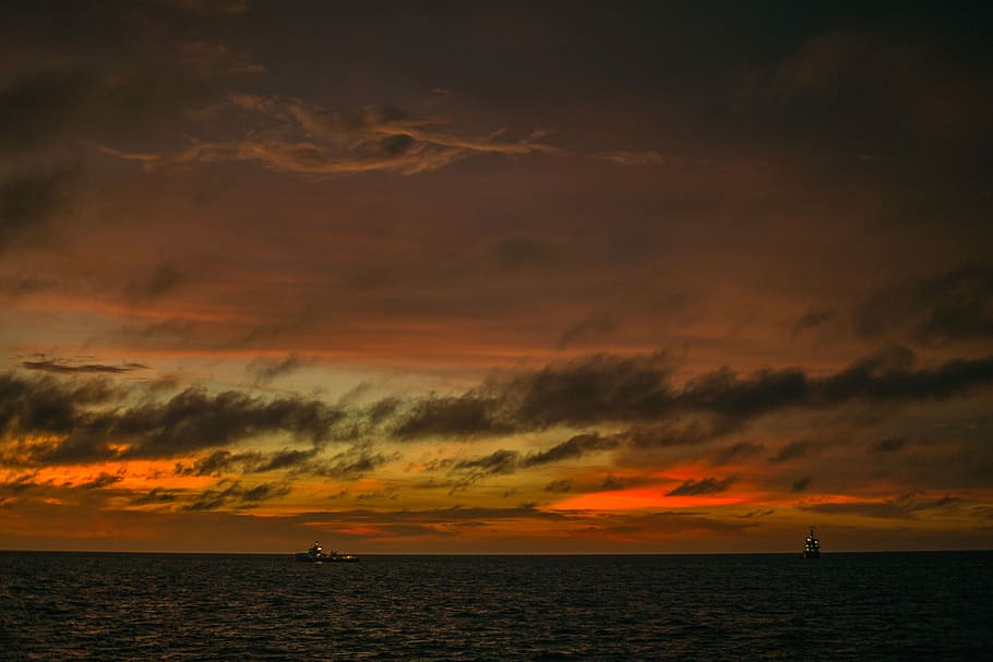 Sunset in Luanda, photo of ship on body of water, drama, dramatic sky HD wallpaper