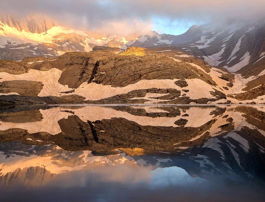 volcano lava closeup photography, brown mountain with snow, reflection HD wallpaper