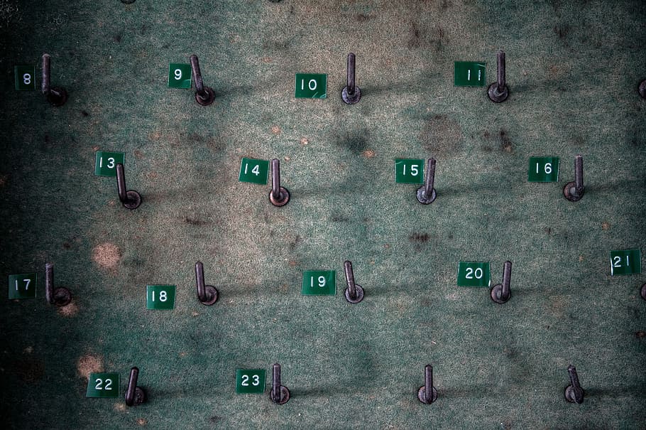 close-up photo of grey key hooks, green and purple illustration HD wallpaper