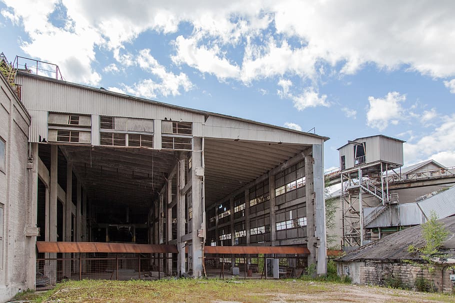 grey steel work house, old factory, abandoned, outdoors, empty