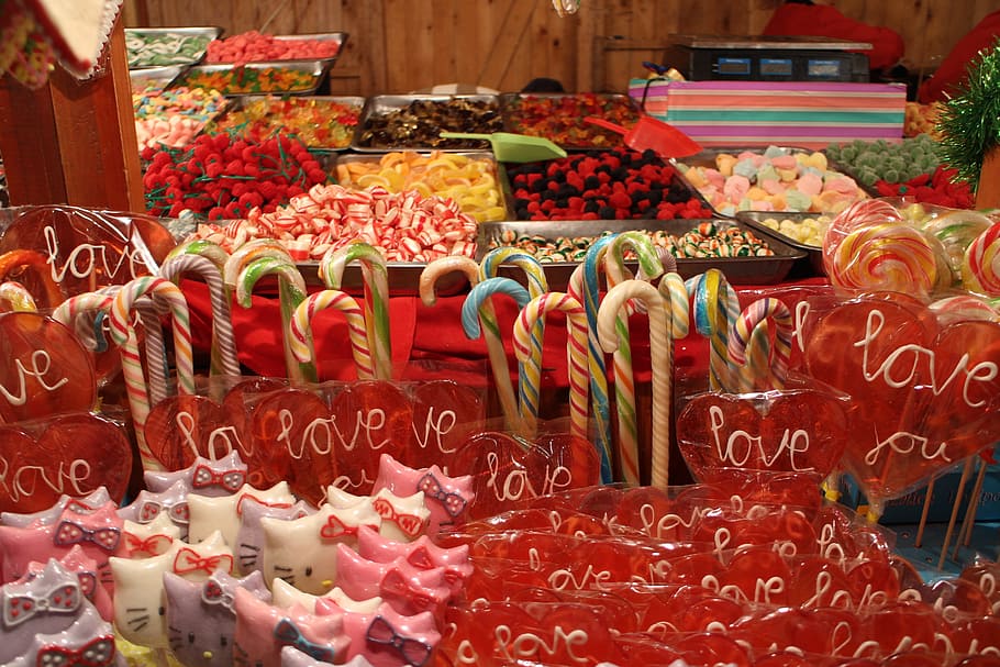 blue, red, and white candy canes near lollipops, sweet, food HD wallpaper