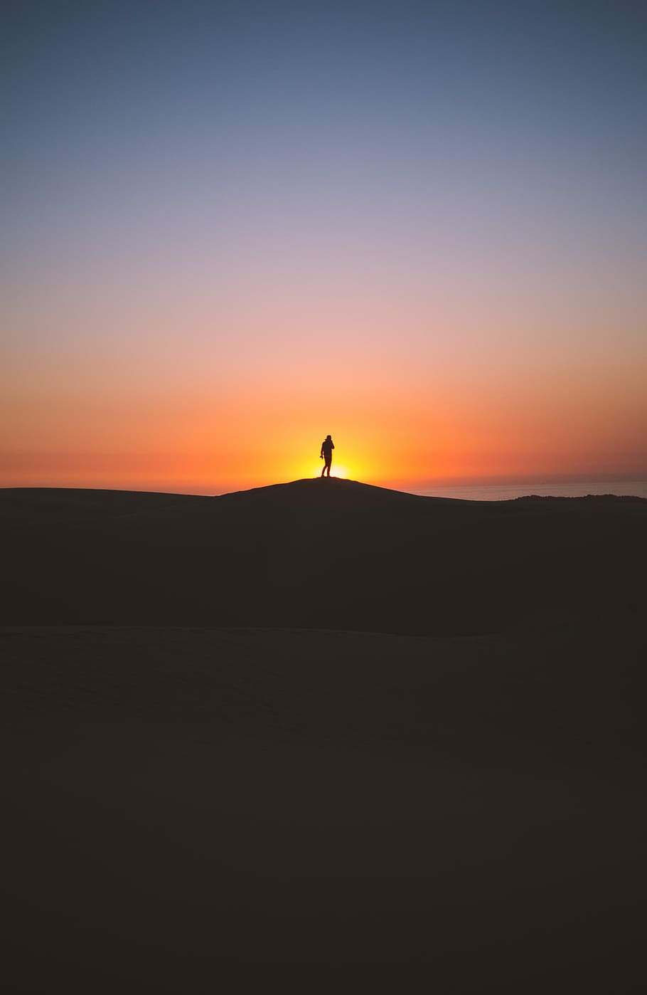 silhouette of person standing on hill, silhouette of person on top of mountain during sunset HD wallpaper