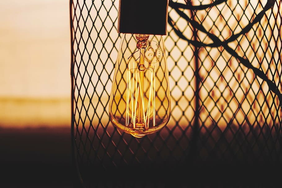 turned-off light bulb, near, gray, metal, screen, design, art