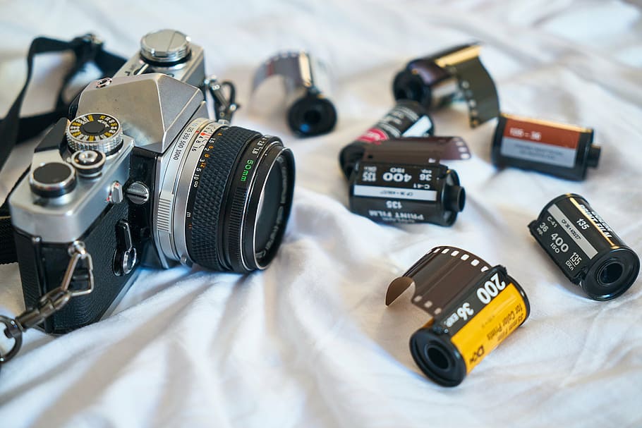 camera beside films, old, notebook, map, holiday, toys hobbies HD wallpaper