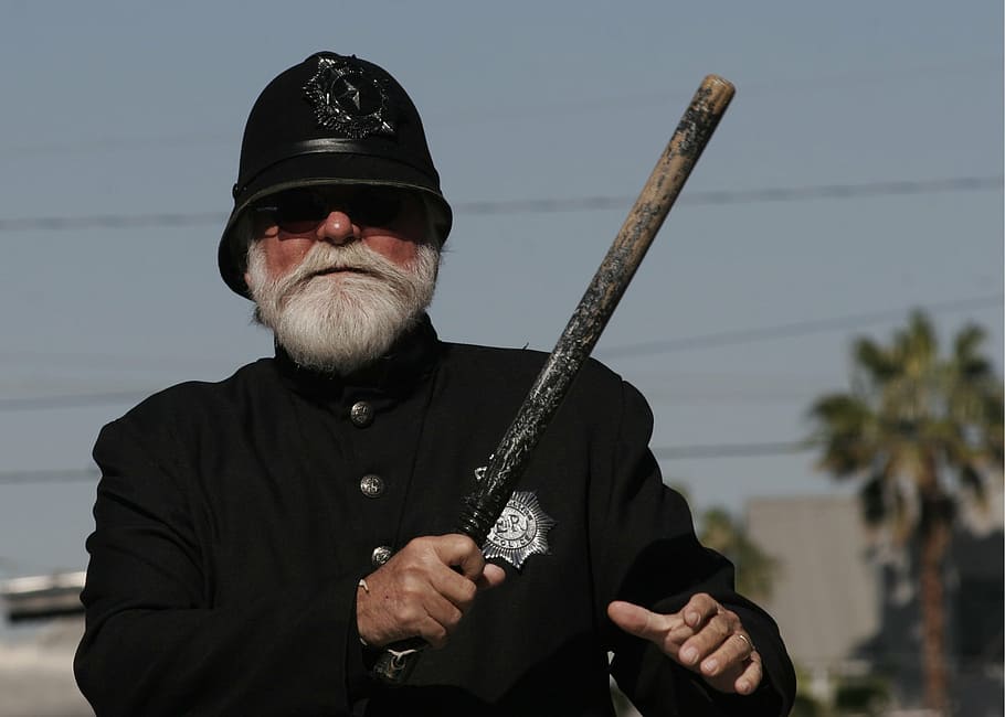 man holding baton, police, policeman, bobby, uniform, male, protect
