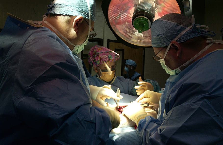 doctors operating inside operating room, surgery, surgeons, operation