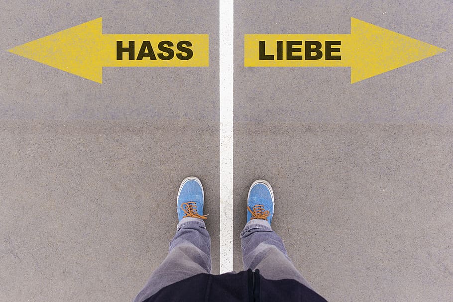 person standing in on gray road, love, hate, german, text, language HD wallpaper