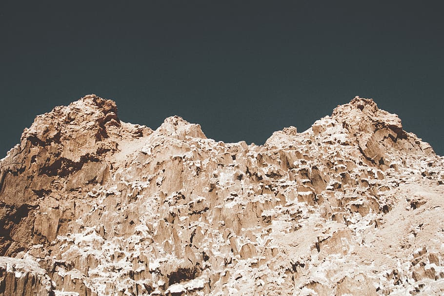 brown mountain, person showing brown mountain, rock, sky, cliff HD wallpaper