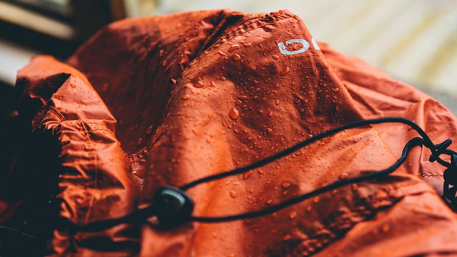 red textile during daytime, wet orange jacket, black, no People HD wallpaper