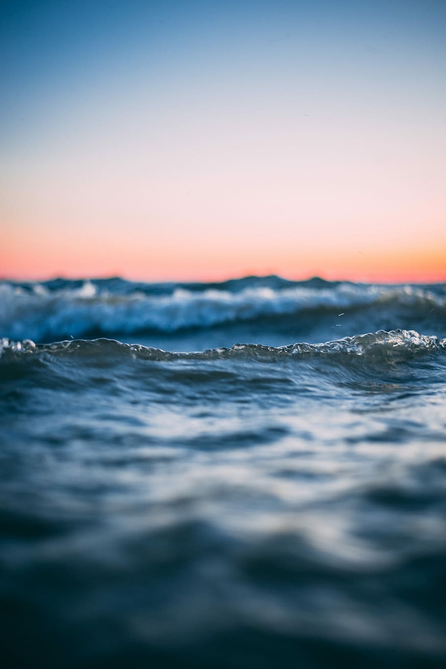 body of water photo, body of water waves at golden hour, tide