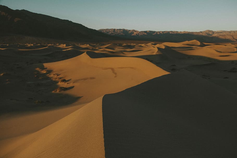 sand dunes during daytime, aerial photo of desert during daytime HD wallpaper