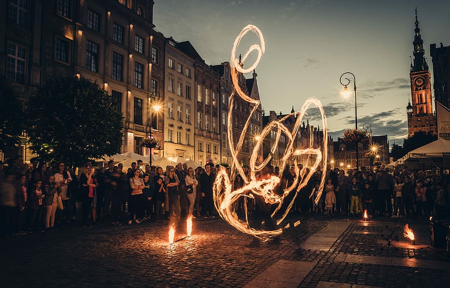 time-lapse photography of fire dancing, time lapse photo of person fire dancing near crowd of people during golden hour, HD wallpaper