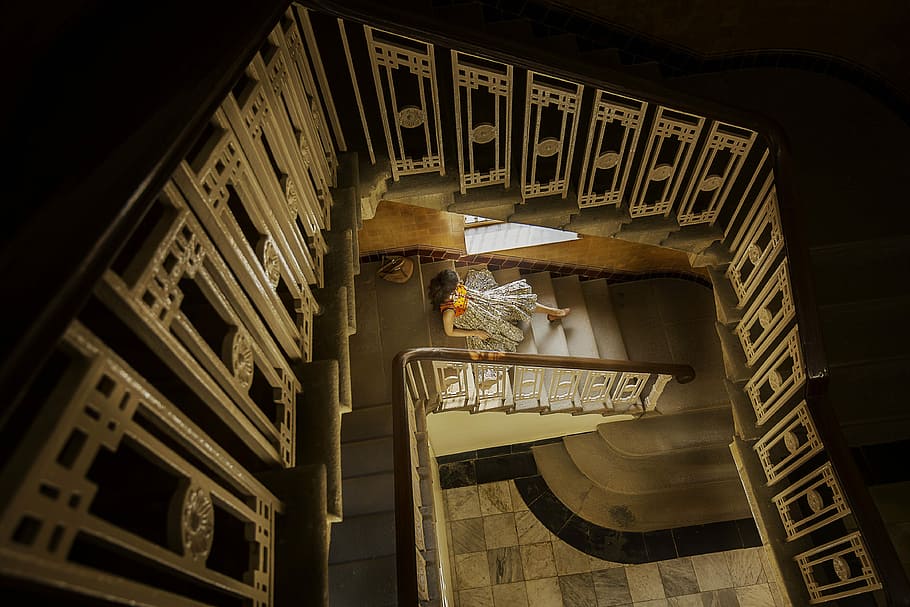 high angle photography of woman sitting on stairway, woman sitting on stairway inside room HD wallpaper