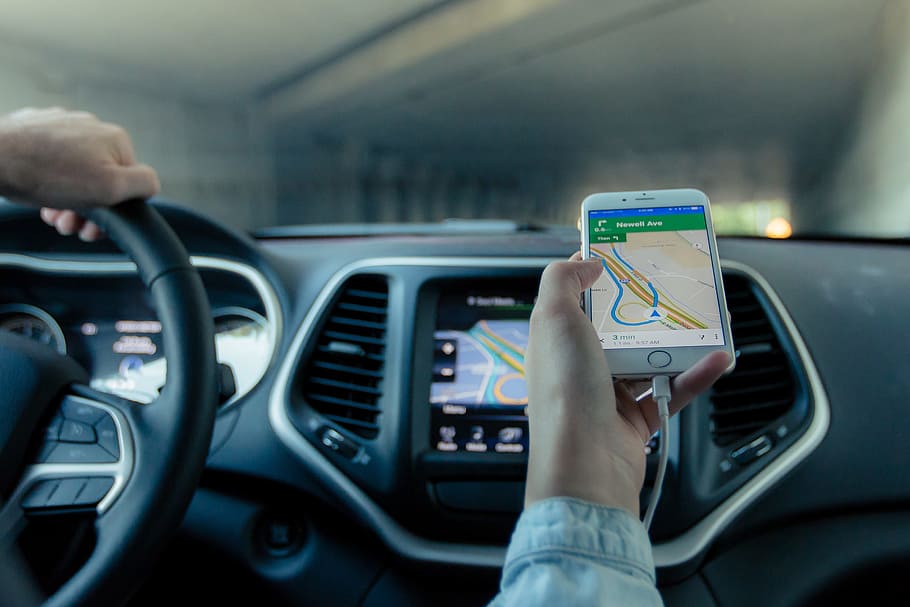 person holding gold iPhone 6 plus showing GPS navigation map HD wallpaper