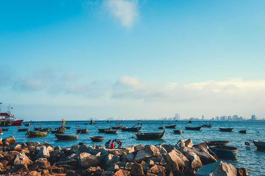 boats on water under blue and white sky, beach da nang, beach viet nam