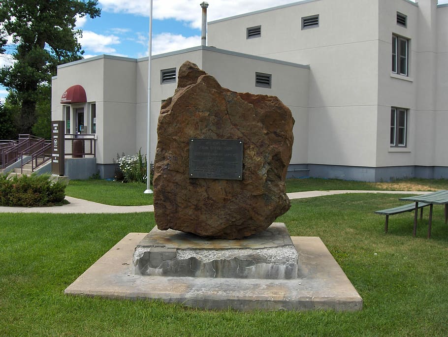 Timmins Chamber of Commerce with Rock and Plaque in Ontario, Canada